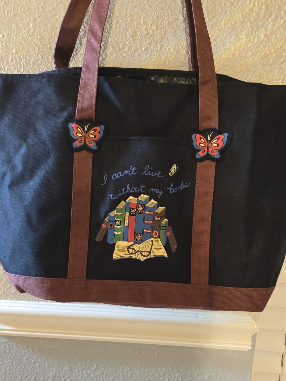 I CAN'T LIVE WITHOUT MY BOOKS Tote with Brown Straps and Colorful Book Graphic
